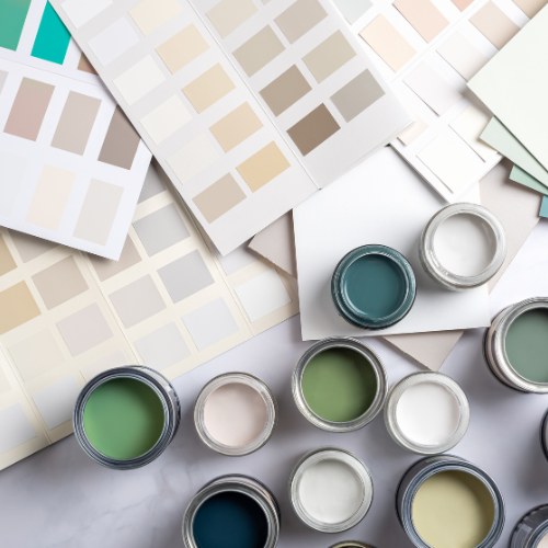 Open paint cans and supplies